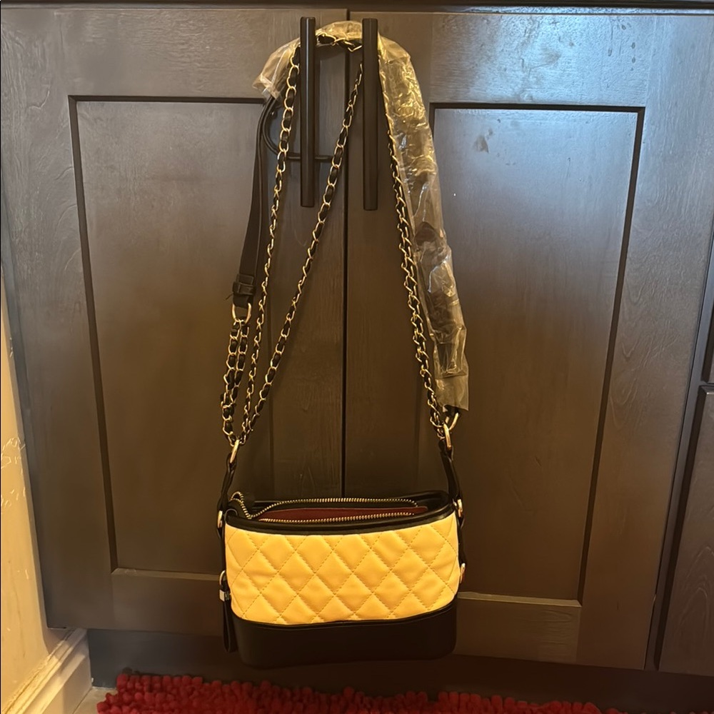 Chic Black and Cream Quilted Shoulder Bag